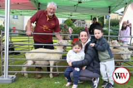 Terry Rowbottom was keen to show his sheep to Kellie Whiting and her children Tylas (5) and Kya (2).