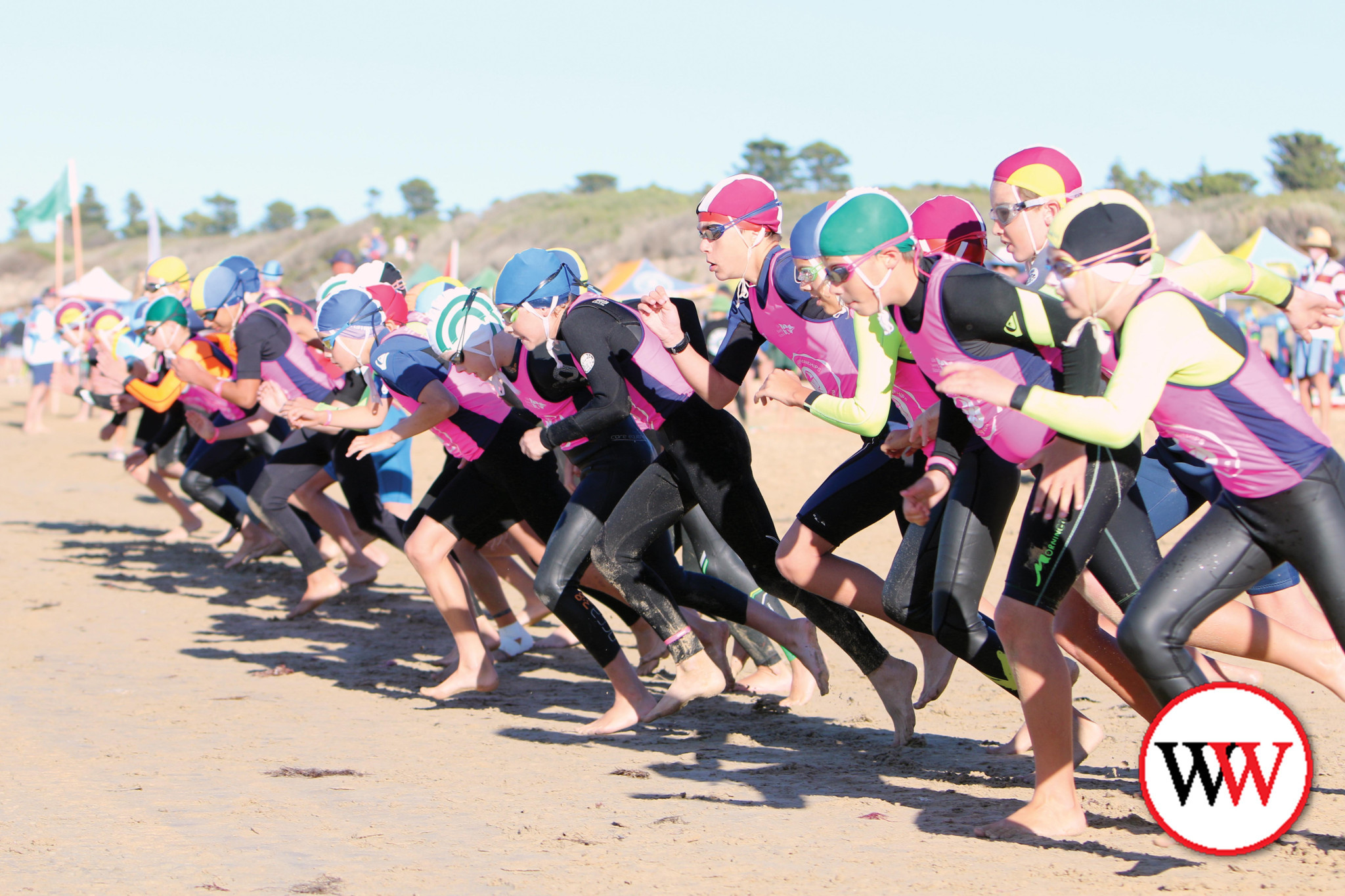 Bathed in sunshine and with the temperature in the high 30s, there was plenty of action on the beach with the running of the junior lifesaving championships.