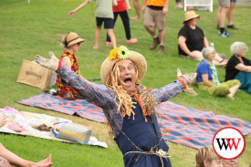 Warrnambool Community Garden’s ‘scarecrow’ entertains the crowds.