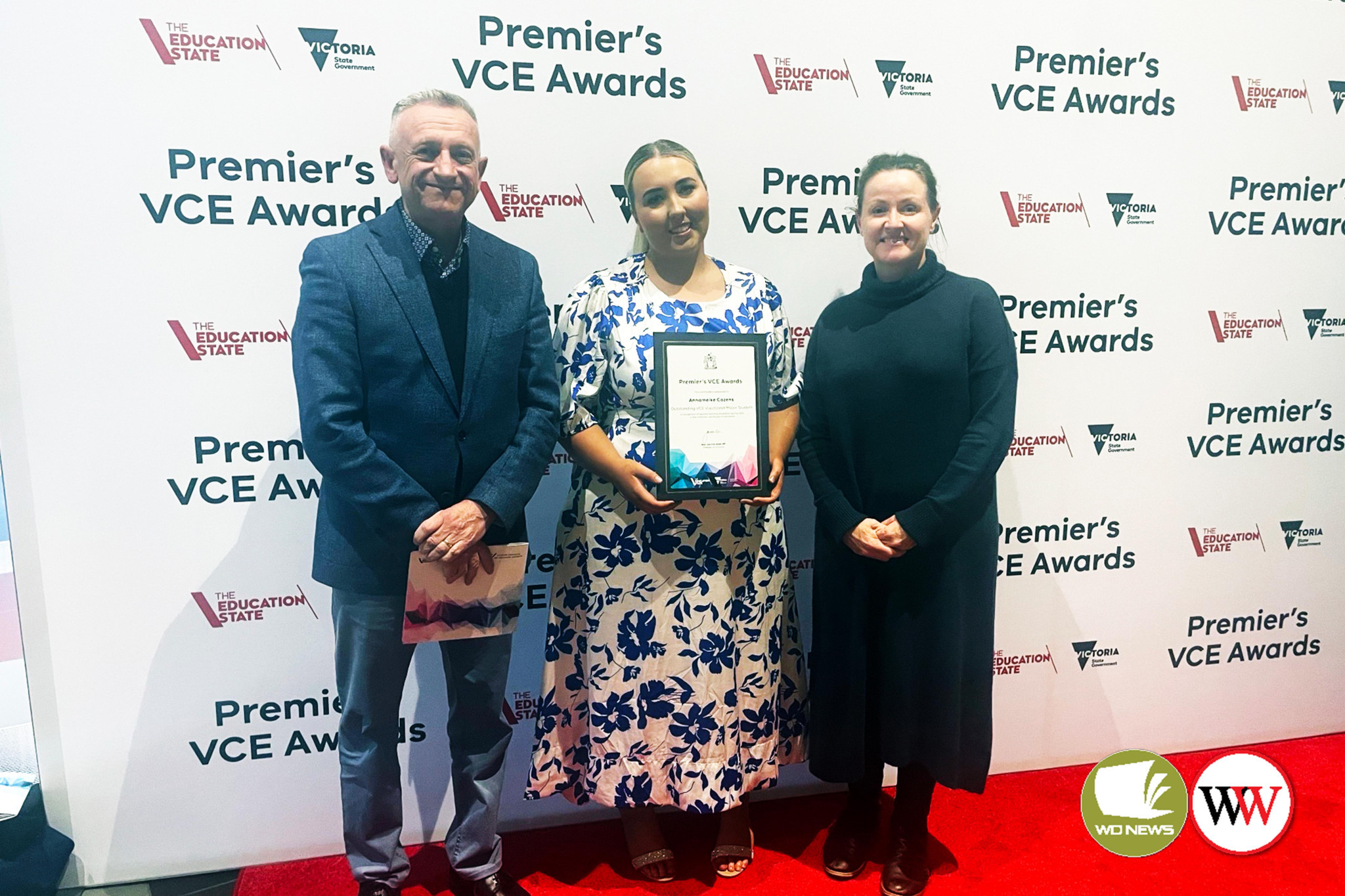 Annameike is congratulated on her award by Emmanuel College principal Peter Morgan and Applied Learning coordinator Rebecca Down.