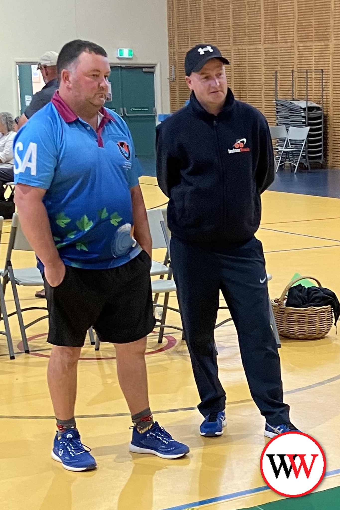 Brett Mungean and Ian Swain watch the game.