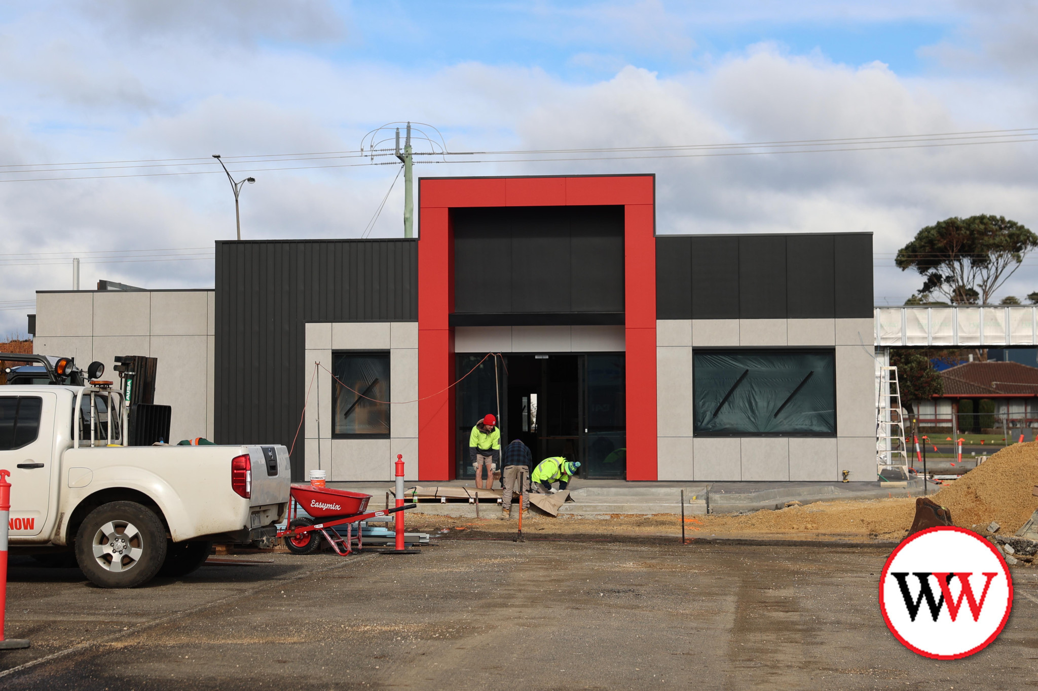 The new store is progressing well, with the recent addition of splashes of red.
