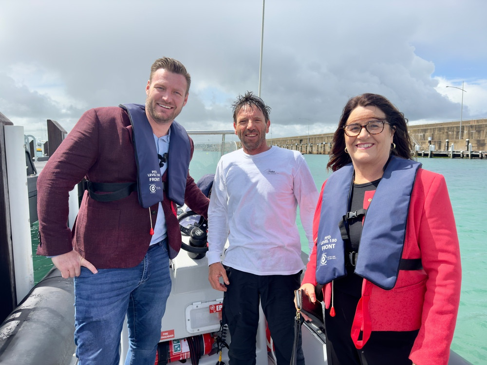 Sam Groth and Roma Britnell enjoy some time on the water with Matt Pettit from Ocean Adventures Tours.