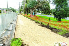 The Mortlake Road footpath under construction.