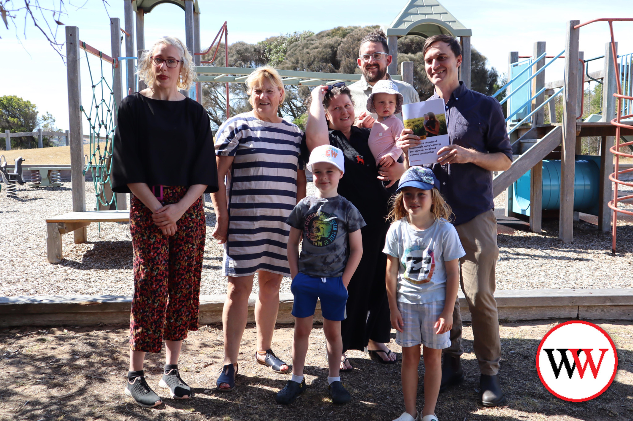 Maddy Butler from The Parenthood (left) with grandmother Mary Coverdale, Orson Johnstone (5), Luca Pendergast (6), Ben and Erin Bowring (holding Reuben) and independent candidate Alex Dyson at Granny’s Grave in Warrnambool.