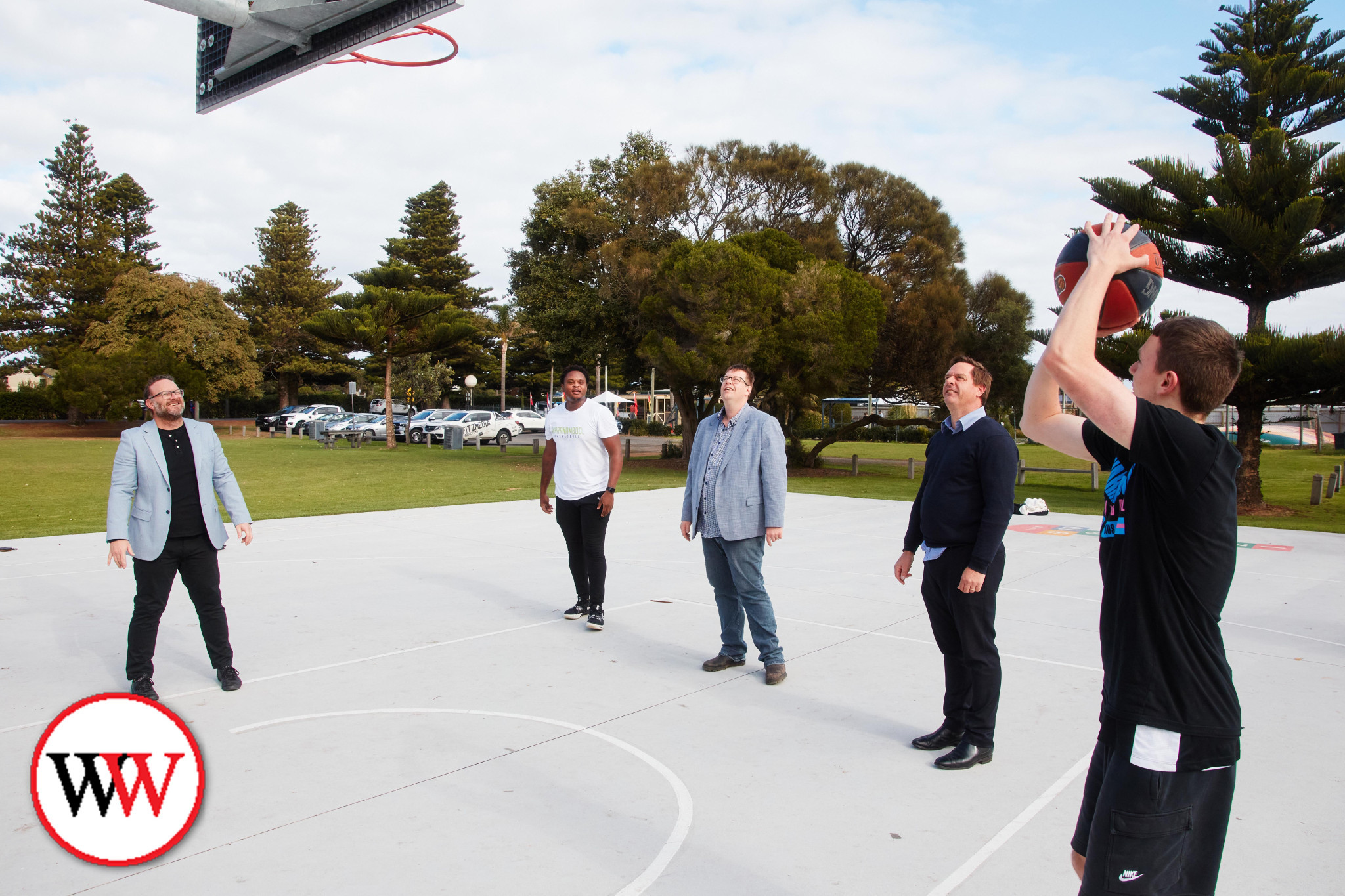 Warrnambool Storm players Arcaim Lallemand and Harry McGorm were keen to show their basketball skills to Warrnambool City Council chief executive officer Andrew Mason, mayor Ben Blain and councillor, Matthew Walsh.