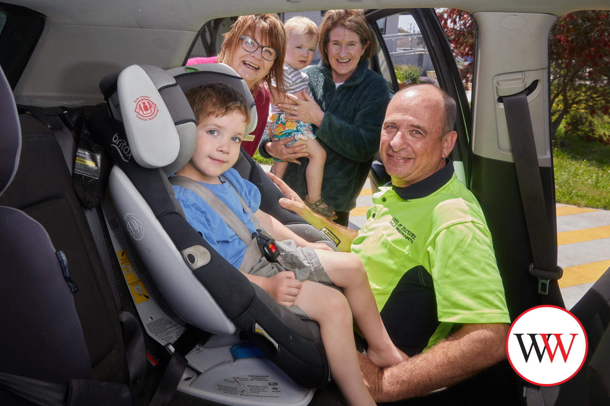 Three year-old Llewyn Pomorin is safe in his car seat after it was checked by Frank Ganino (right). Also pictured are Jill Bourke (West Warrnambool Neighbourhood House), Henrik Pomorin and Joanne McKinnon. Picture courtesy Warrnambool City Council.