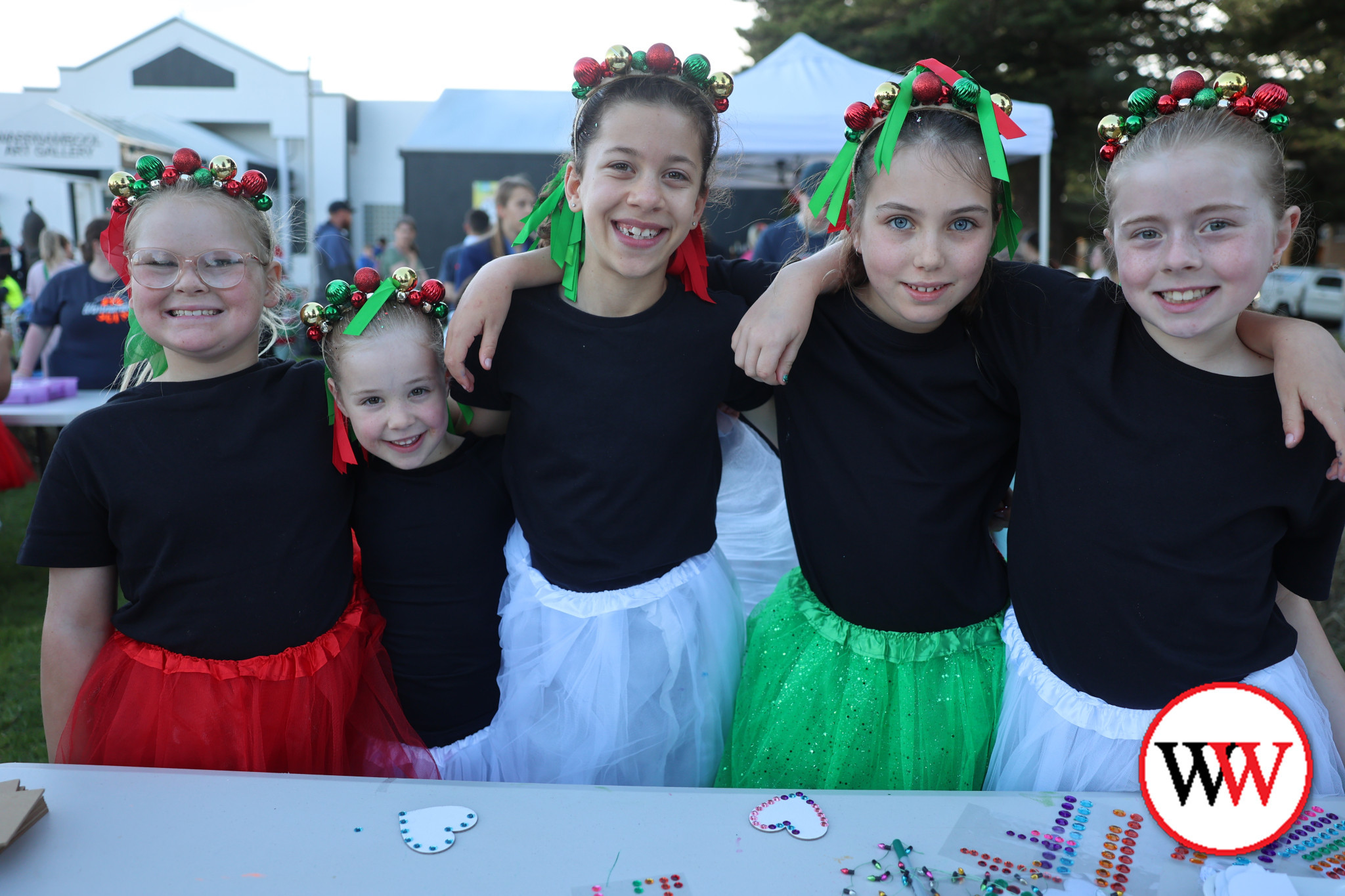 Enjoying the activities at the carols are, from left, Shylah Wilson, Ruby Hunter, Evelyn Mehanni, Elise Schulz and Ellie Newton.