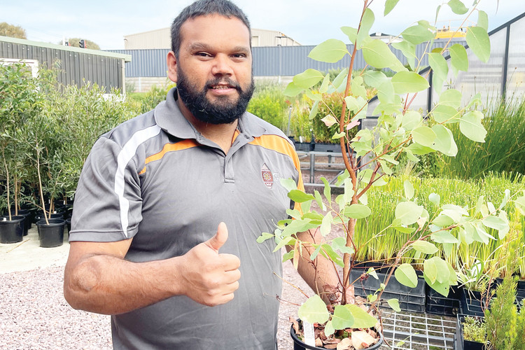 Dylan enjoys working outdoors and chatting with customers about bush tucker and the variety of plants on offer at Worn Gundidj Nursery.