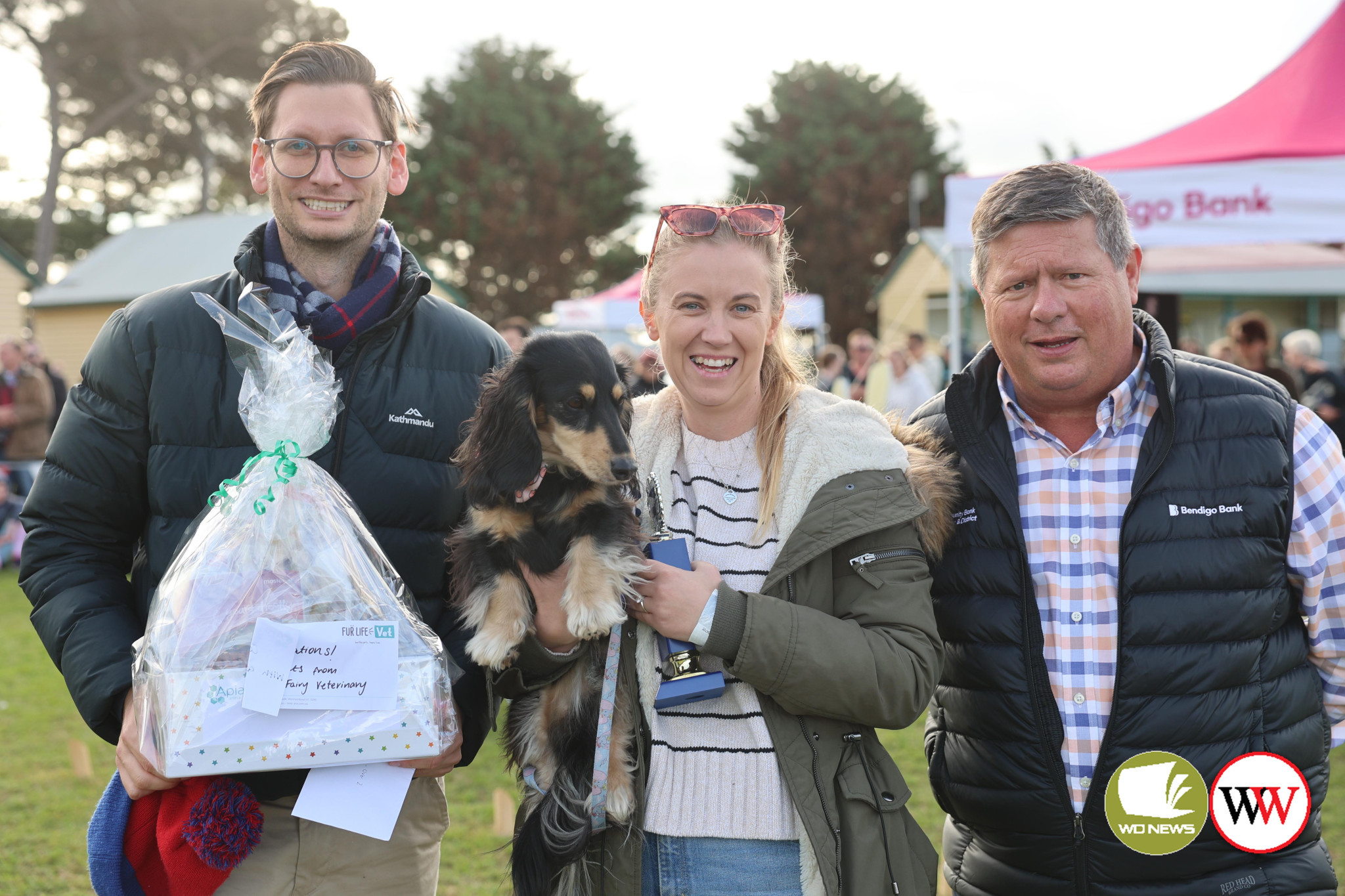 ‘Jeff’ made it back-to-back victories at the Port Fairy Dachshund Dash last weekend, taking out the Over 2 category. Jeff (who last year won the under 2 final) is pictured with proud owners Ben Holt and Kate Fergusson along with Damien Gleeson from event sponsor, Community Bank Port Fairy and District.