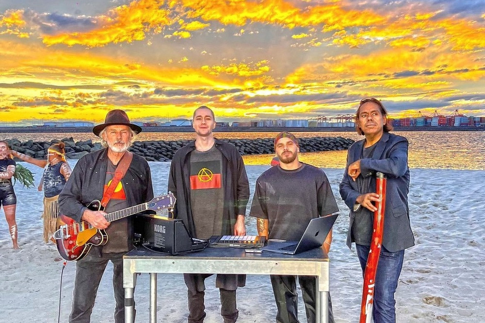 Livin’ on borrowed time: South west export Shane Howard of Goanna (from left) joined musicians Moss, Tasman Keith and William Barton on the set of a new video for the re-imagined ‘Solid rock (Sacred ground)’ to launch the 2023 National Rugby League’s 2023 Indigenous Round. 2023I