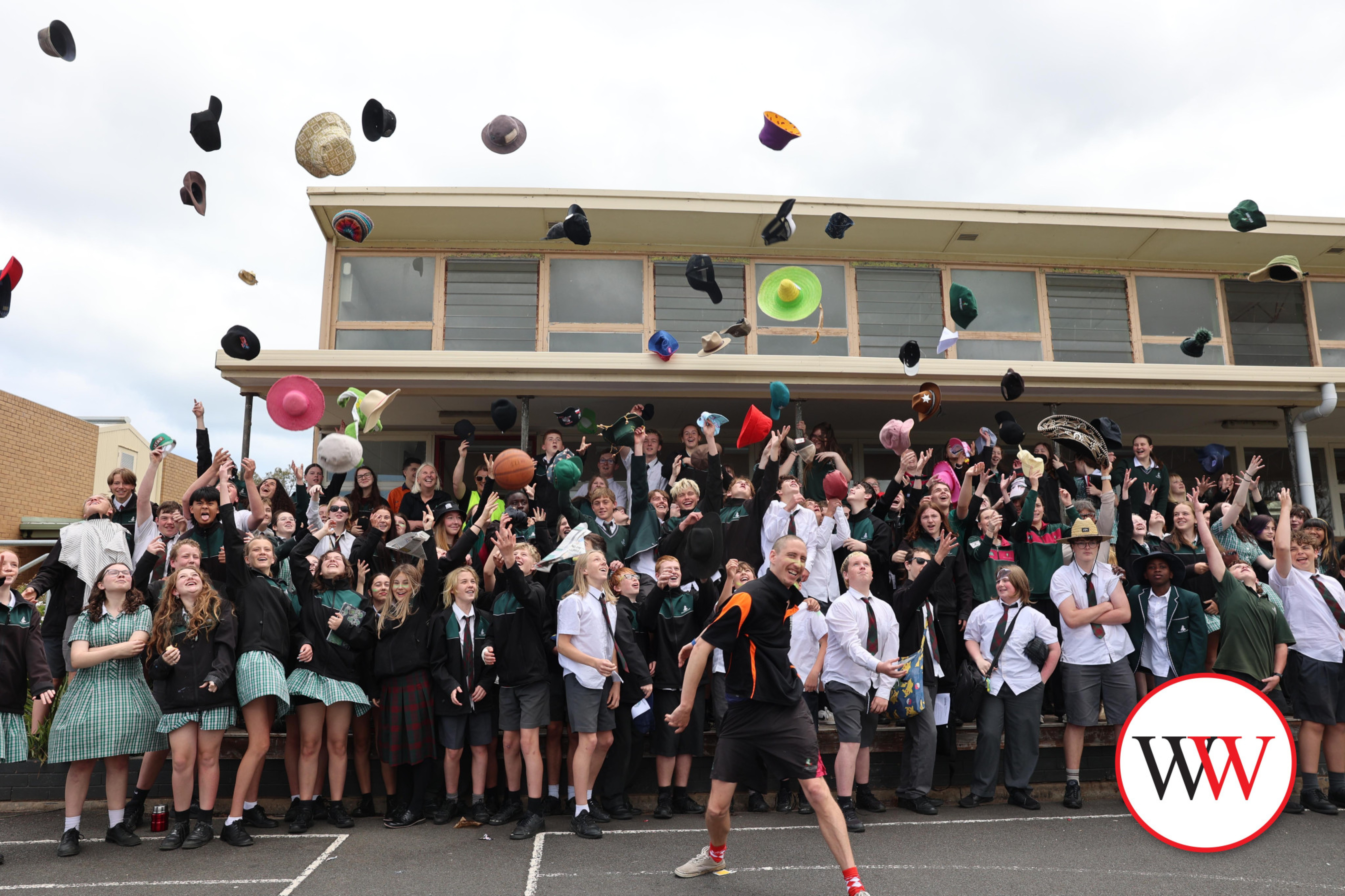 Teacher Harry Coffey celebrated his head shave on Tuesday afternoon, surrounded by Brauer College students who were encouraged and inspired to wear hats when outdoors.