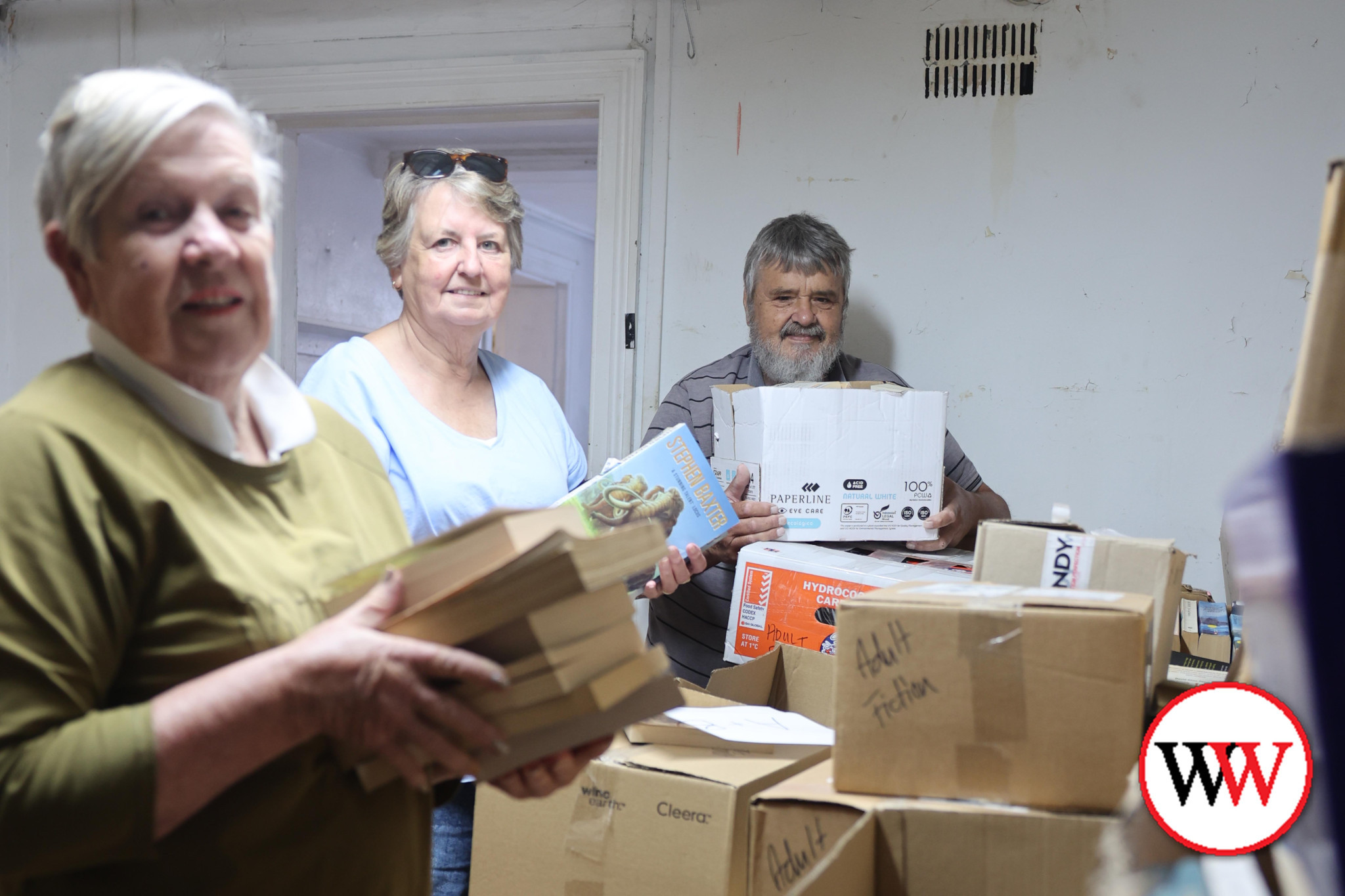 Anne Adams, Joan Austin and Tony Austin are hoping people will volunteer to help move hundreds of books in preparation for the next Rotary Club of Warrnambool Giant Book Sale.