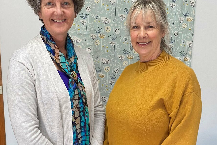 Support co-ordinator with Warrnambool and District Community Hospice Leeona van Duynhoven (left) and Jeanette Miller, a past carer who supported her father.