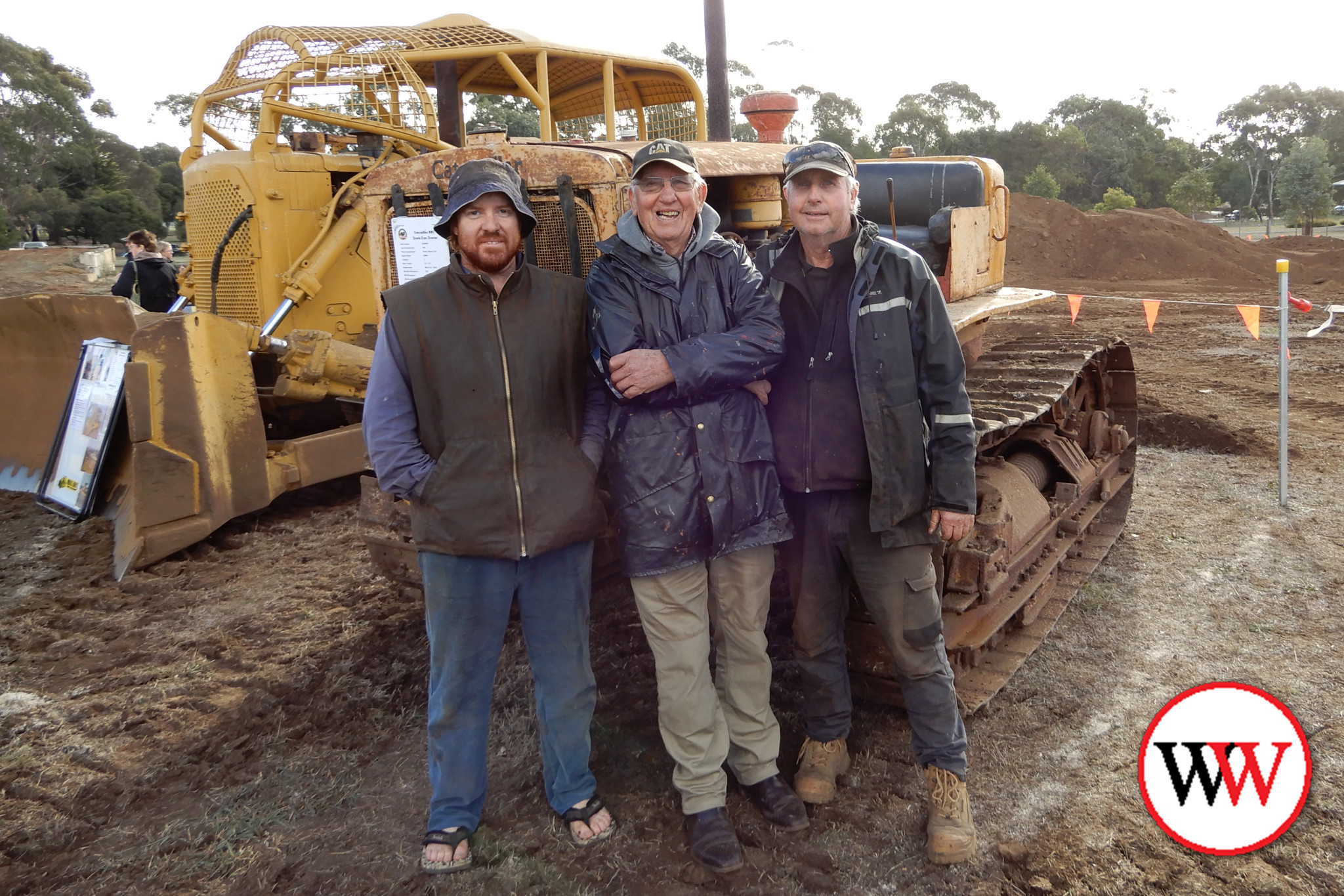 Ollie Guyette (Ballangeigh), Lawrence Hose (Naringal) and Gary Atwell (Laang) with Lawrence’s Caterpillar RD7.
