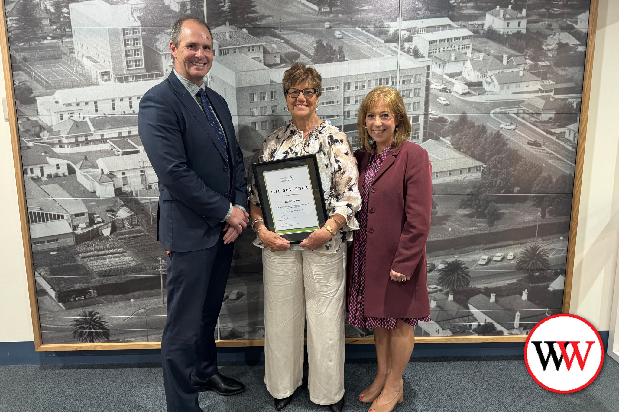 South West Healthcare chief executive officer Craig Fraser and board chair Allison Patchett (right) congratulate Life Governor Lesley Togni.