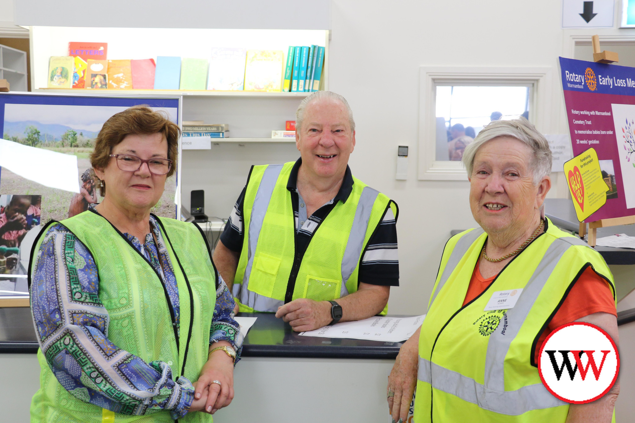 Jenni Lewis, Ken Sharpe and Anne Adams were kept busy with the book sale.