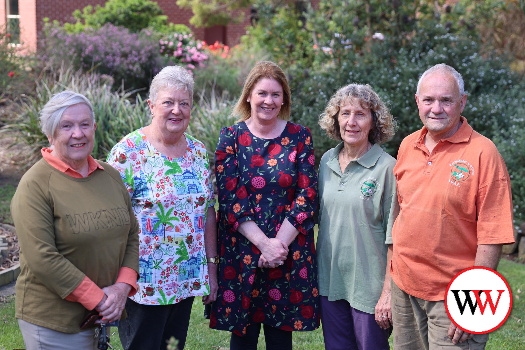 Enjoying the gardens of Gail and Greg Lemmens (right) are Rotary Club of Warrnambool members Anne Adams, Judy Ross and club president Kelly Curran (centre).