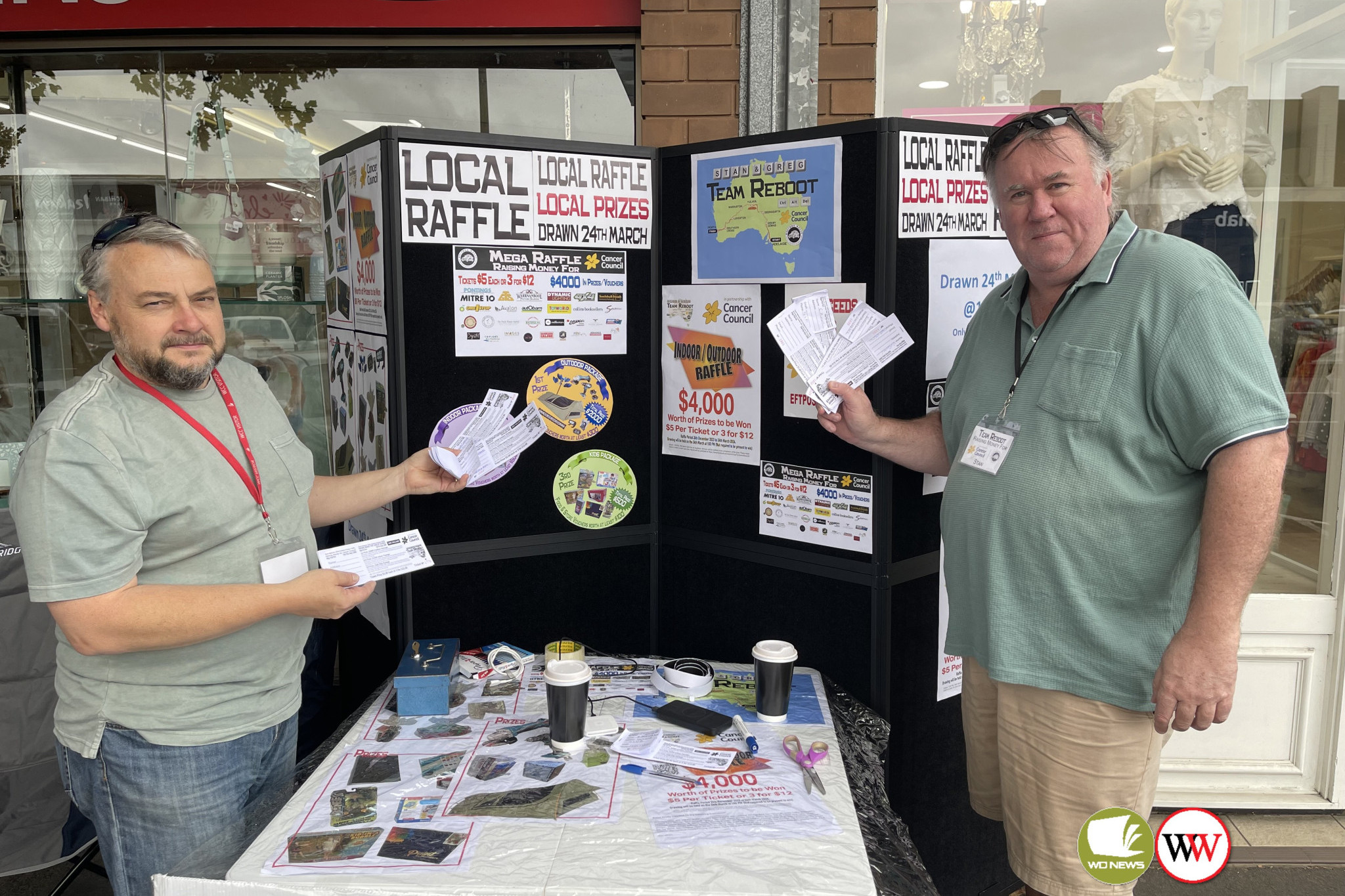 Stan McCullagh and Greg Bos encourage everyone to purchase a raffle ticket for the chance to win some great prizes – with all money raised going directly to Cancer Council.