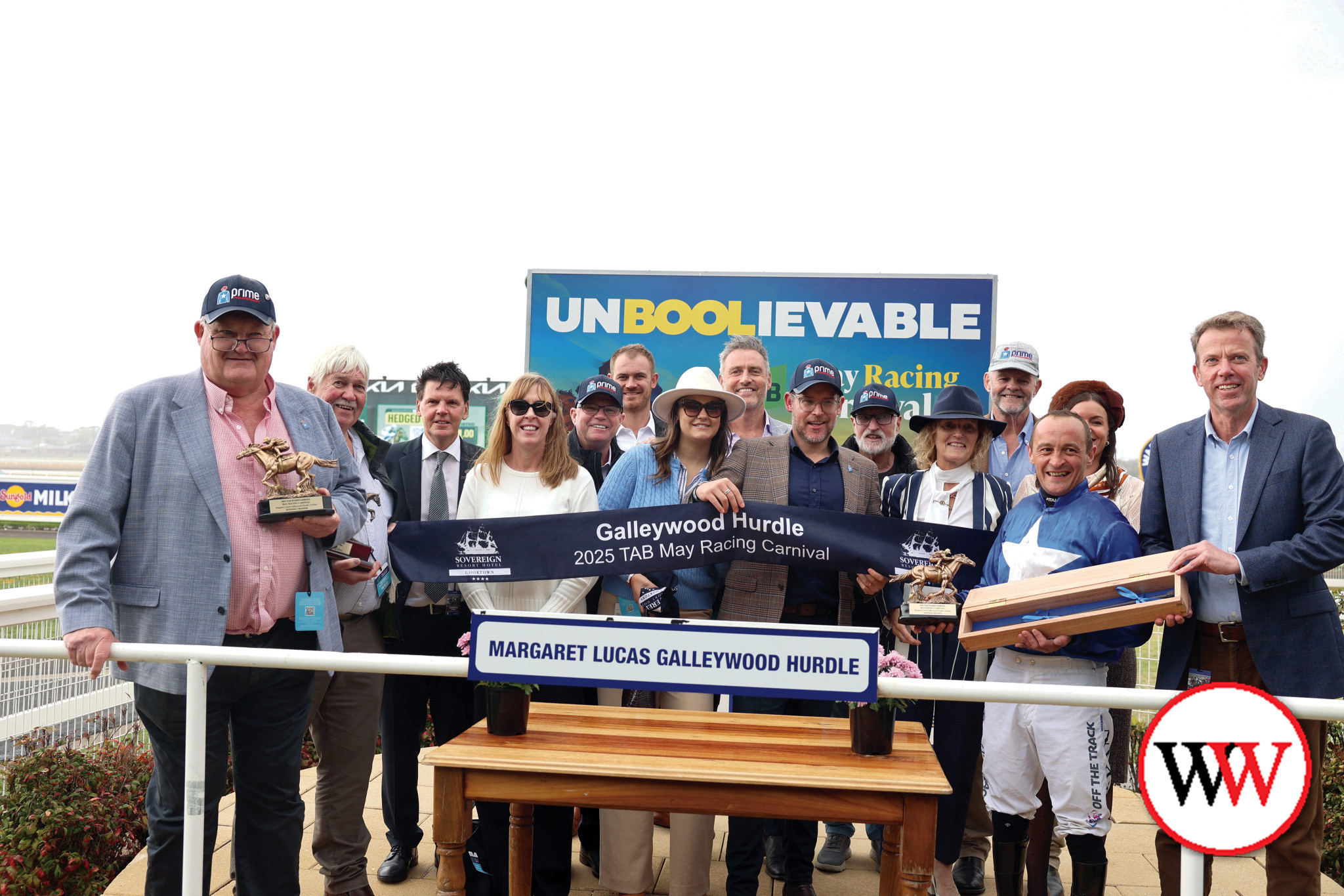 Connections of The Cunning Fox (trained by Patrick and Michelle Payne) celebrate their win in race six, the Margaret Lucas Galleywood Hurdle.