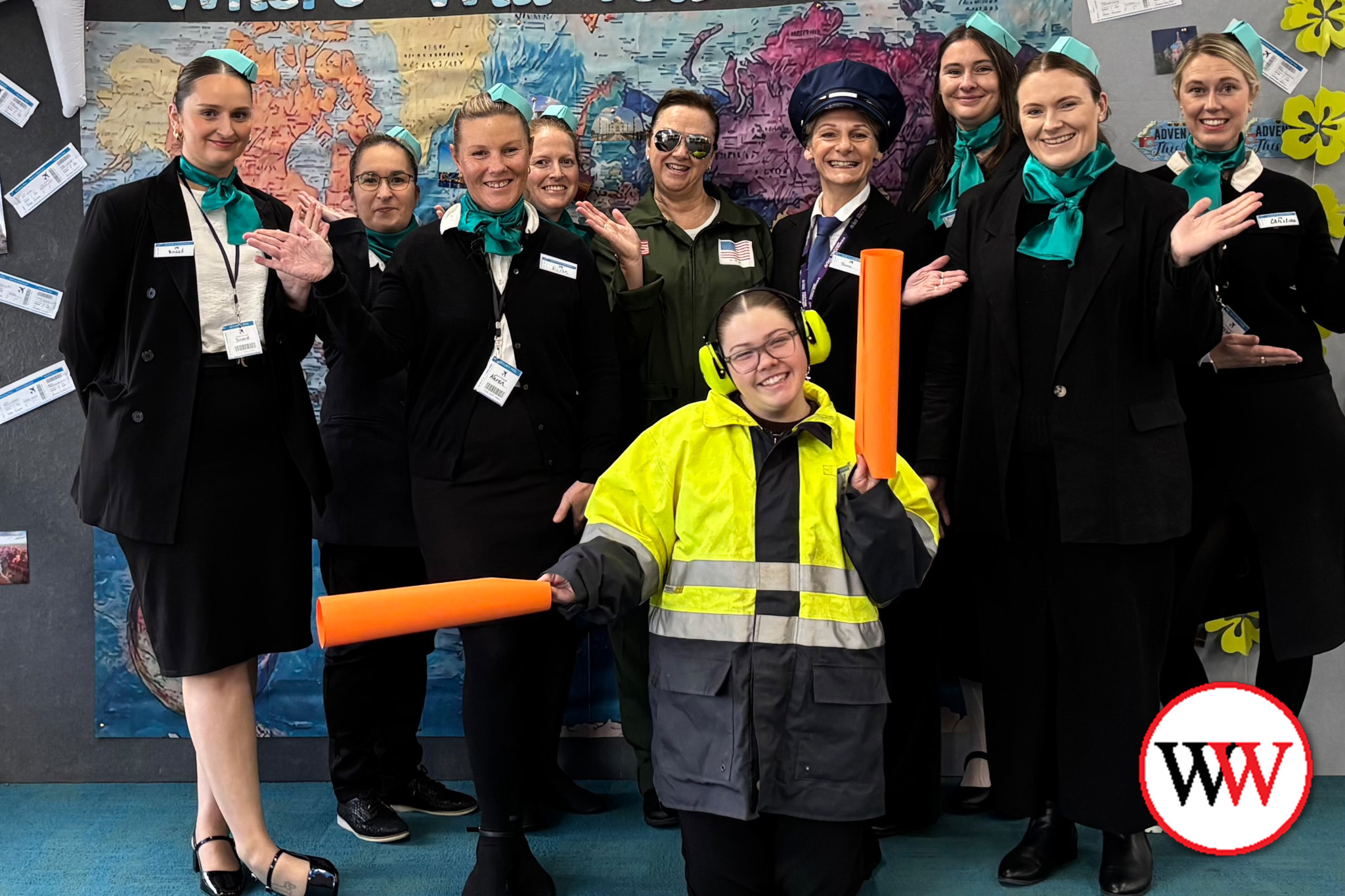 Sinead Grey, Tanya Tampion, Karen Holdsworth, Petra Lammers, Georga Whiting, Fiona Ludeman, Brianna Kavanagh, Zoe Evans, Christina White and (front) Sasha Suckling prepare to welcome ‘passengers’ on board.