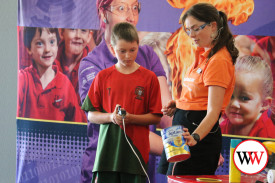 Harvey takes part in a demonstration with Amy from Questacon.