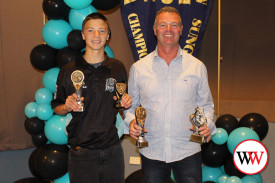 Father and son winning combination, Ethan and Corey Couch, with their awards.