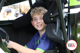 Eleven year-old Rylan Hunter enjoyed a close look inside one of the cars on display.