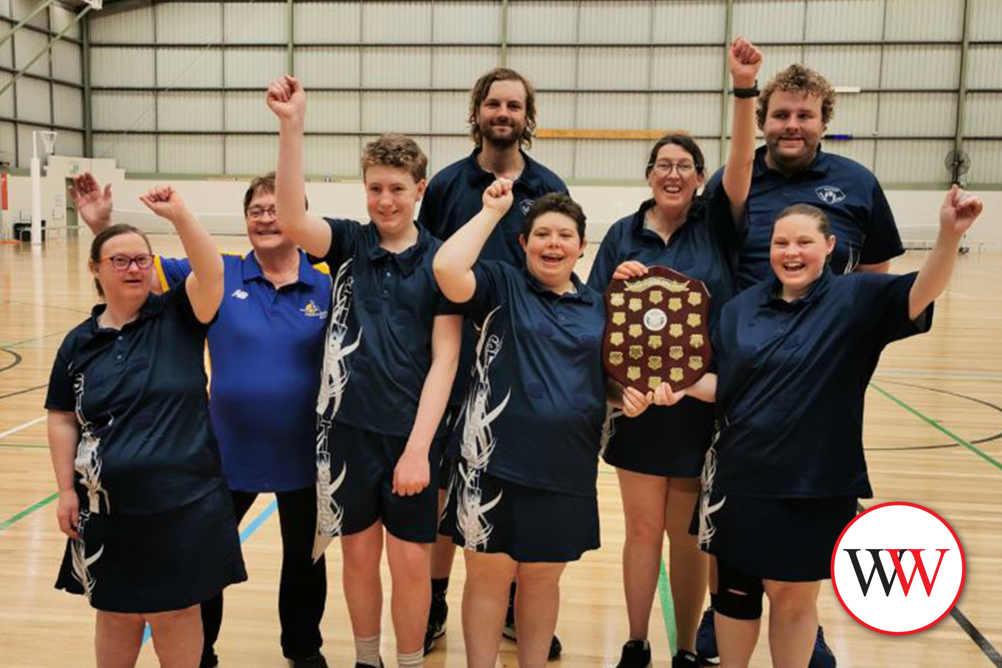 The Stingers celebrate their season win.