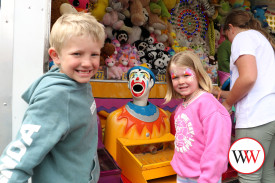 Harvey and Evie Robertson try their luck at the clowns.