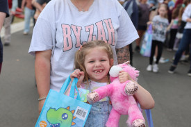 Six year-old Millie Townsend (with mum Kirsten) had her arms full with showbags and toys.