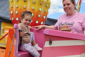 The spinning cups was loads of fun for two year-old Cobie Kenny of Mortlake (with mum Danielle).