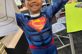 Illuka Briggs-Burns dressed as Superman.