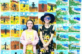 Charlotte Cowley and Allira Brown in front of the student’s renditions of Sidney Nolan’s famous works.