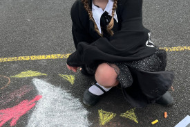 Charlotte Cowley dressed as Wednesday Adams.