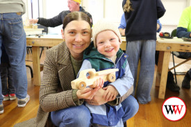 Holly and three year-old Logan Trounce were happy with their wooden truck.
