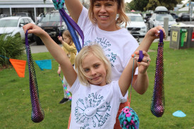 Zia Hughson of Warrnambool was happy to join her mum Diane while she led the poi twirling activity on the green.