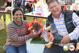 Best dressed: two year-old Coco took out the prize for the best dressed award much to the delight of her proud owner Dhershini Suntharam of Port Fairy – who received the award from the Community Bank’s Damien Gleeson.