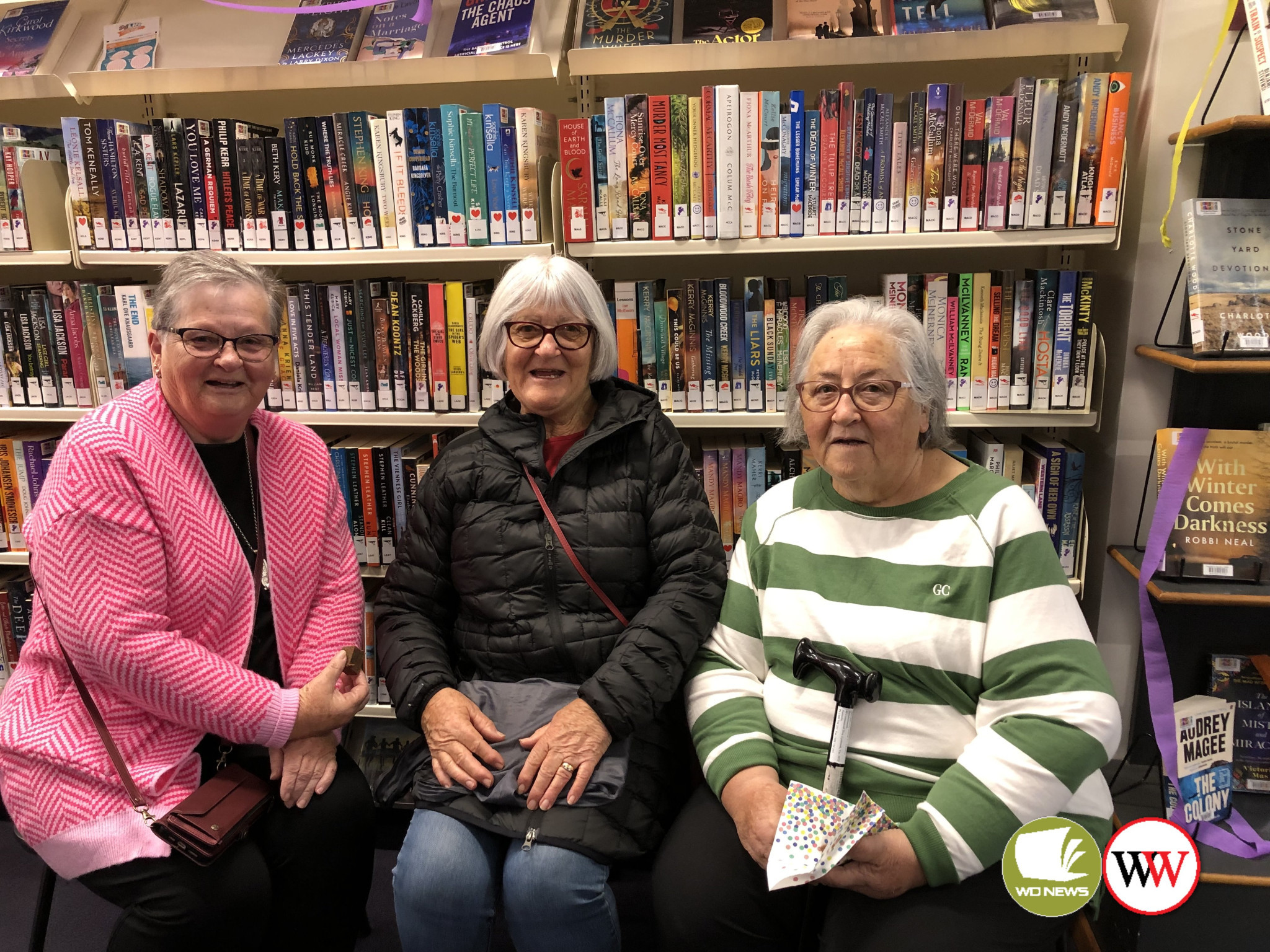 Margaret Whitehead and her sisters Robyn and Lyn enjoyed the library’s birthday celebrations on Saturday.