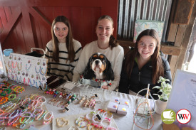 Indi Hocken, Amarli Frankel (with dog Rio) and Lacey Hocken at their ‘Foreva Sista’ stall in the Young Makers Market.